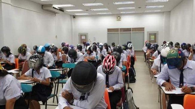 Viral Mahasiswa Thailand Pakai Helm Saat Ujian, Ini Faktanya