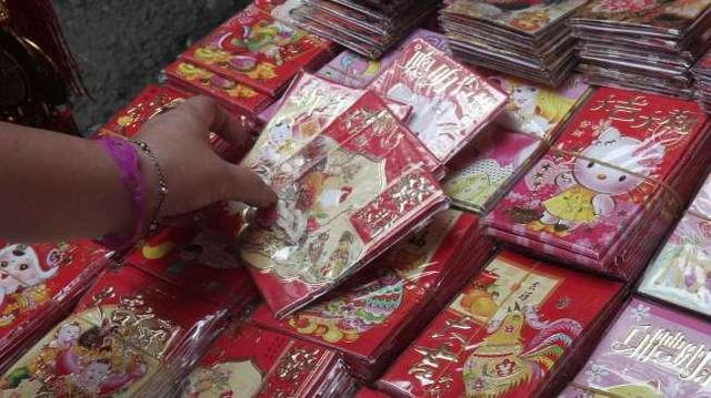 Tak Lagi Pakai Amplop Merah, China Bagi Angpao Via WeChat